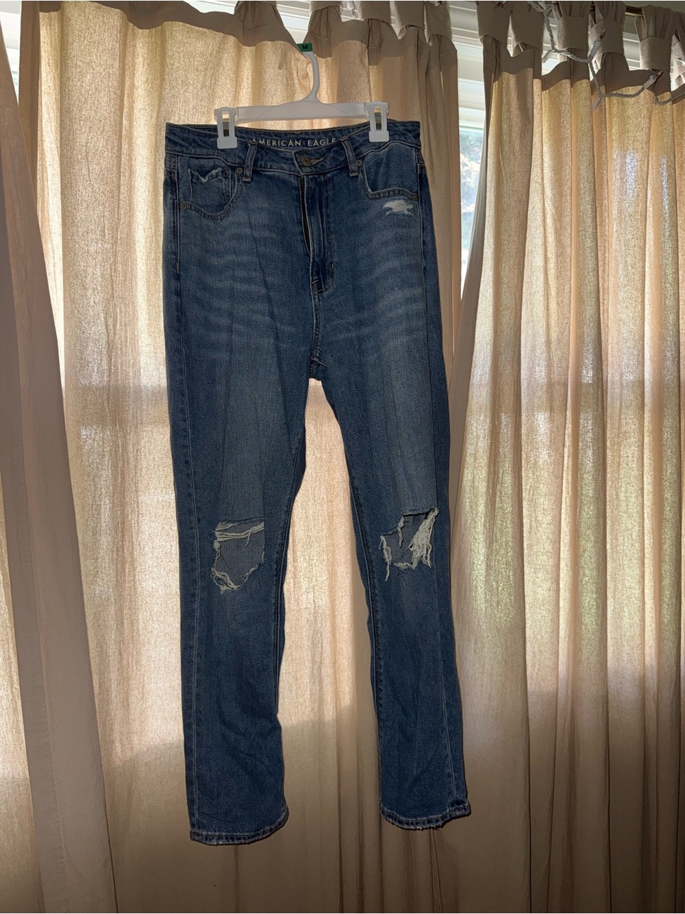 American Eagle Outfitters women’s Dark Blue Distressed Slim Straight Jeans